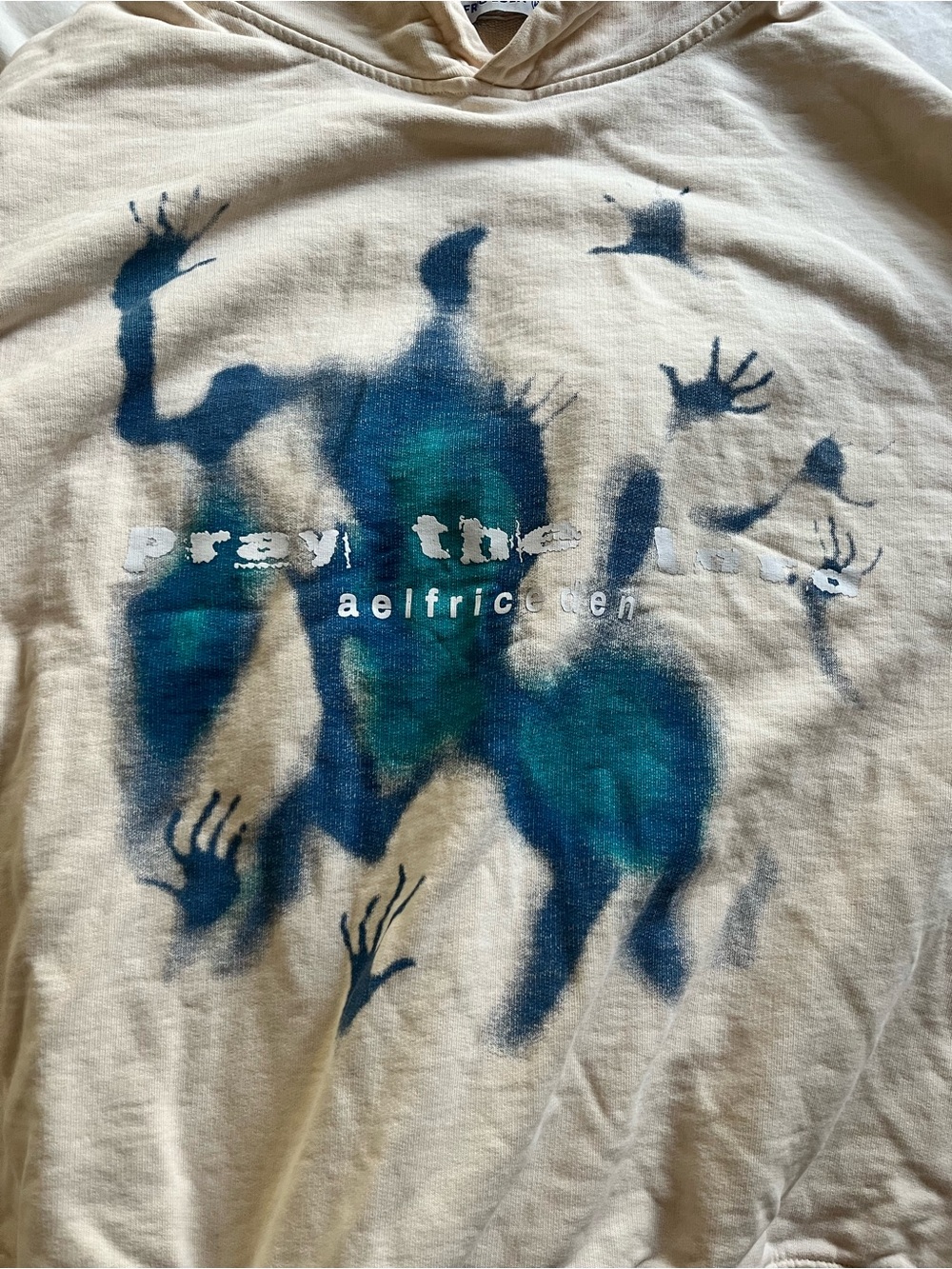 Aelfric Eden Cream Hoodie with Blue and Teal Abstract Graphic